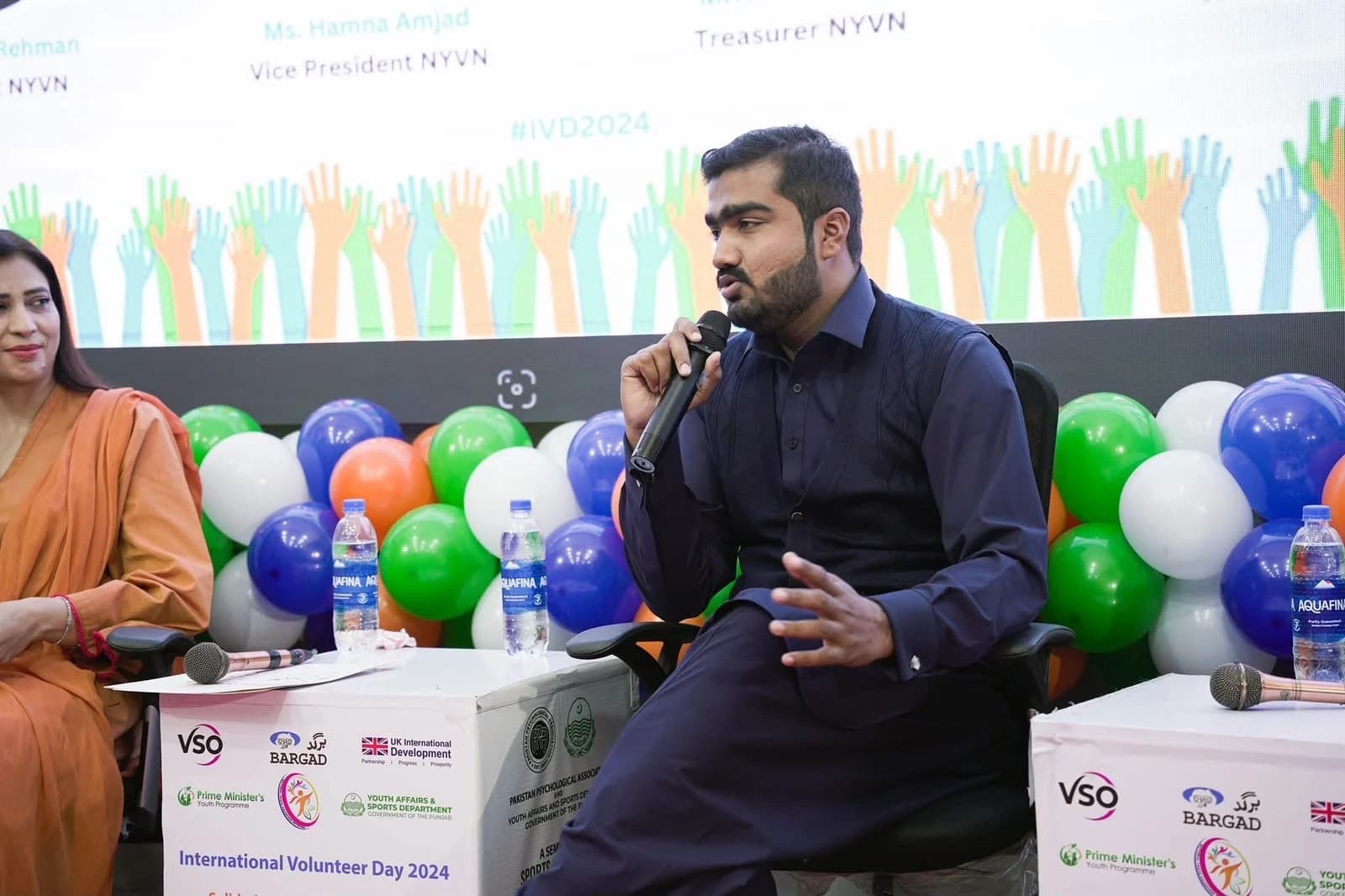 Faiz speaking at International Volunteer Day 2024